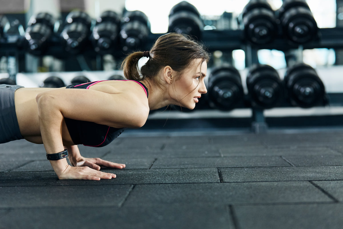 30mm heavy duty rubber gym tiles in PT studio barbell zone — Olympic lifting flooring UK