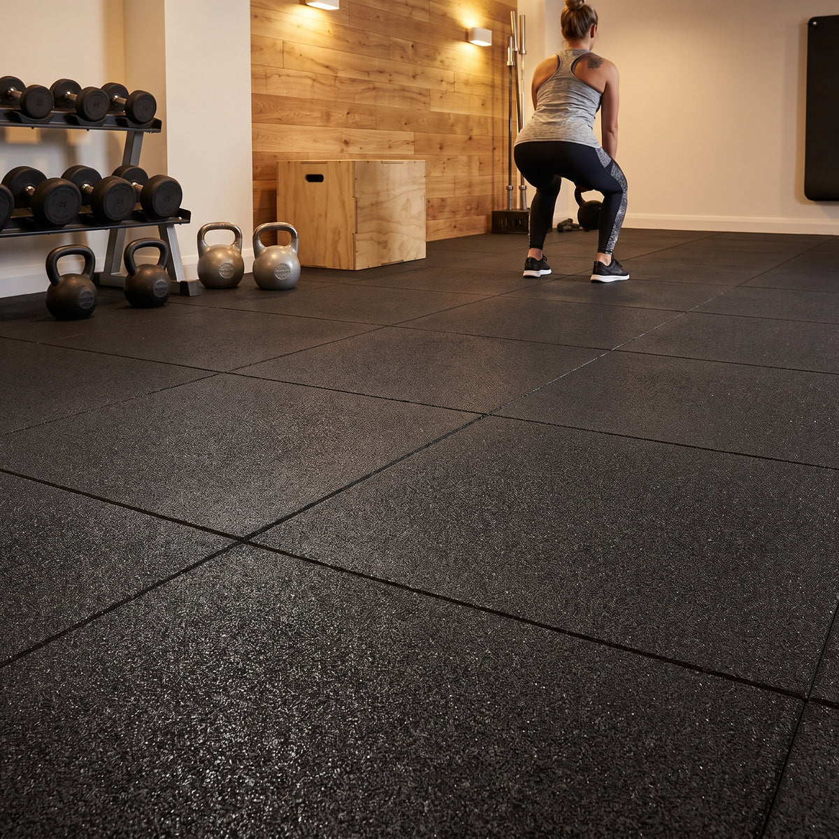 20mm black rubber gym flooring 1m x 1m tiles with tight butt joints in a personal training studio