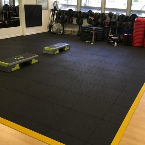 Customer photo: rubber gym flooring installed in a UK home gym