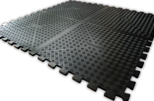 Four DuraSof interlocking rubber gym tiles locked together