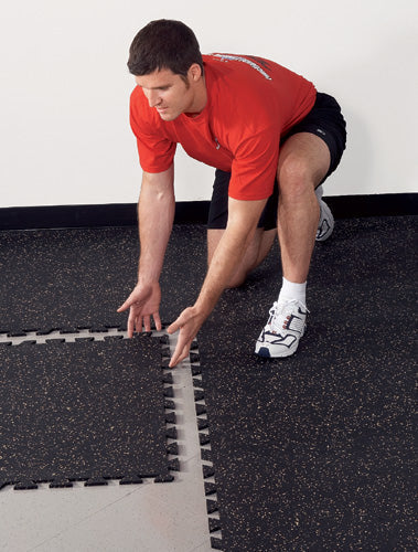 12mm interlocking rubber gym tiles blue black fleck 1m x 1m installed in commercial gym UK